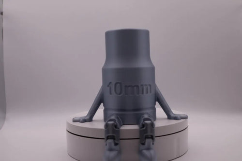 Gray cylindrical object with '10mm' marking on a white background