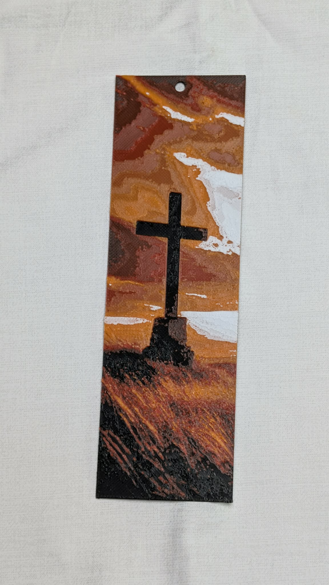 Artistic depiction of a cross on a textured surface with a neutral background