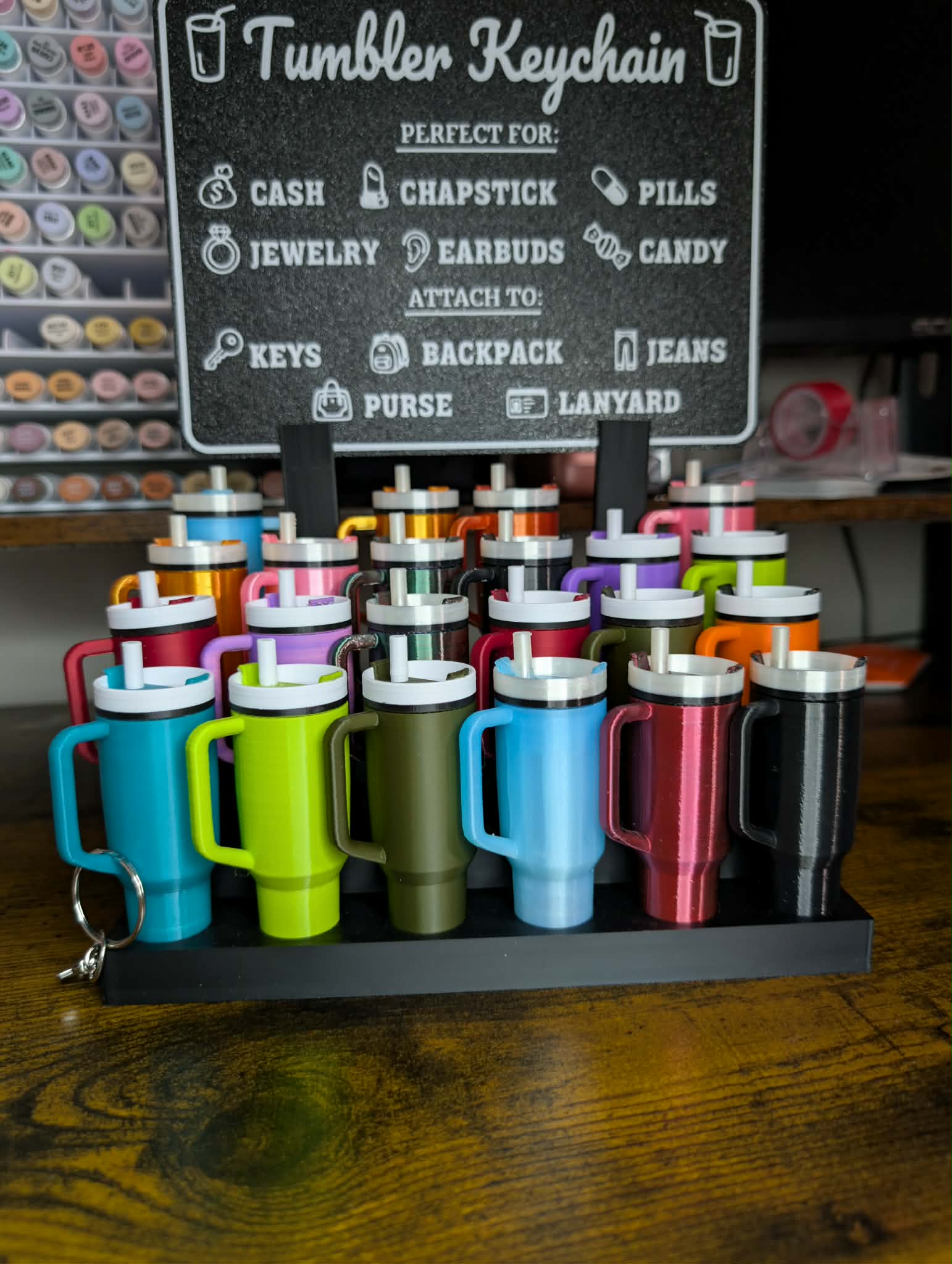 Group photo showing all 14 mini tumbler keychain color variations