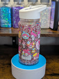 Decorative water bottle with cartoon characters on a wooden surface