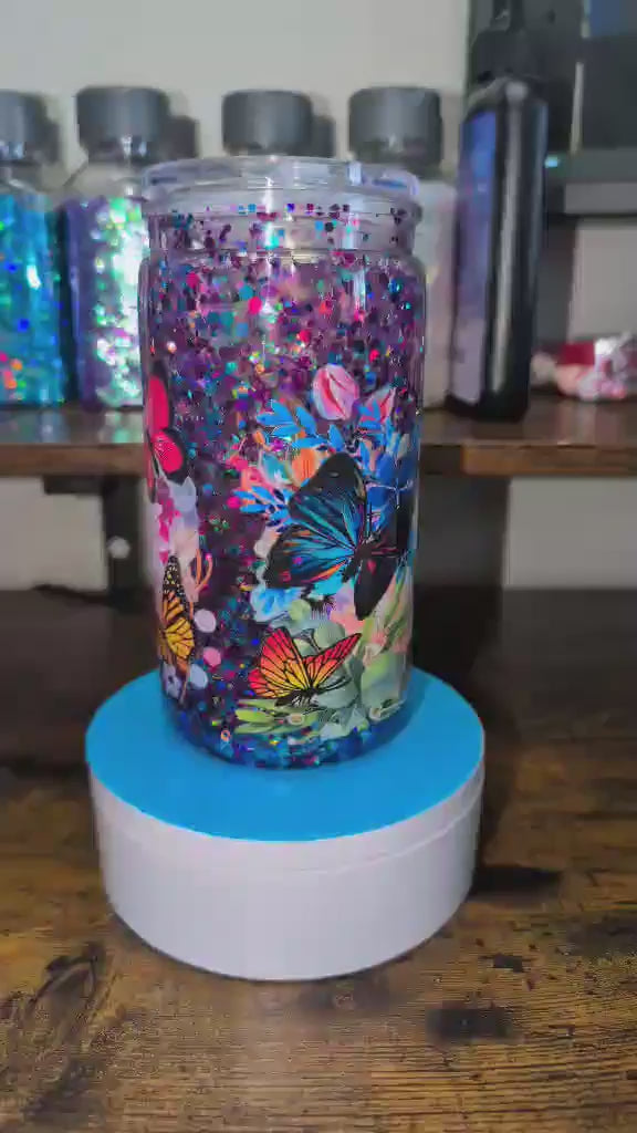 glitter-snow-globe-cup-multicolor-butterflies-flowers-in-action-video